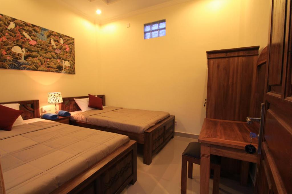 Kt. Kuaya Home Stay Ubud Quarto foto